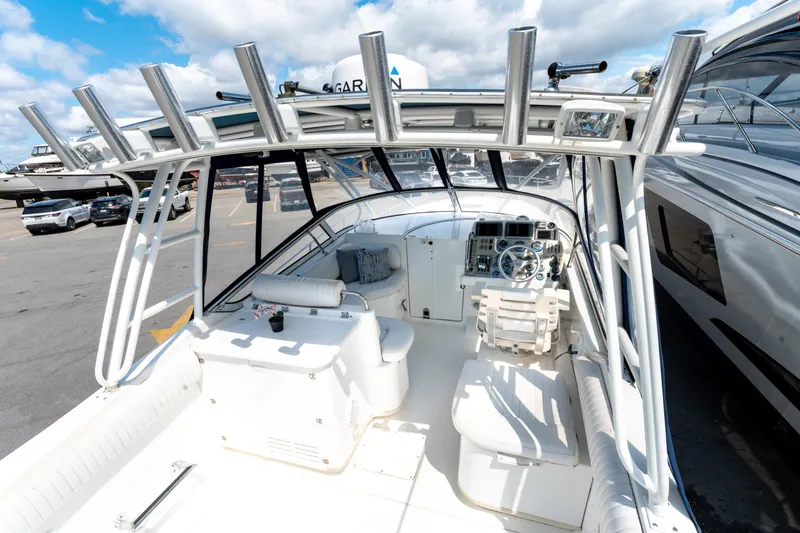  Yacht Photos Pics 2008 Fountain 38 Sportfish Cruiser interior with helm, seating, and rod holders.
