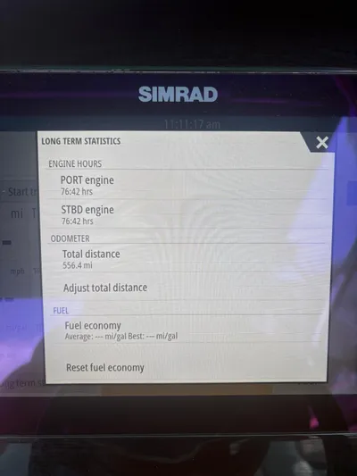  Yacht Photos Pics Simrad display showing engine hours and statistics for 2022 Robalo R317 Dual Console.