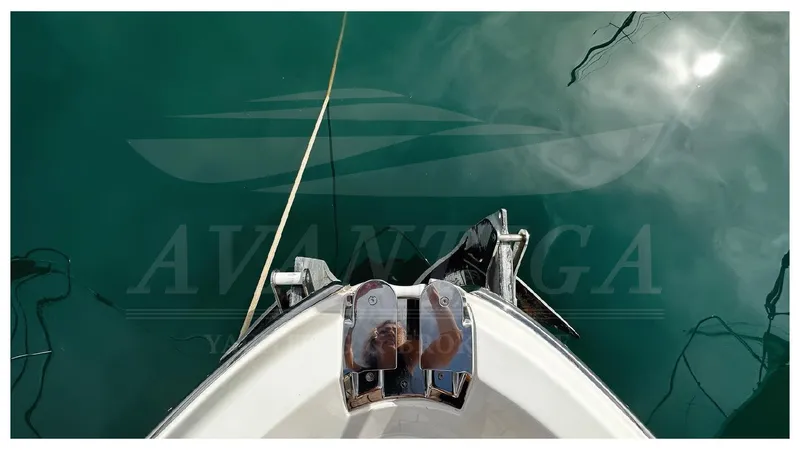  Yacht Photos Pics Bow view of 2003 Ferretti Yachts 680 on calm water.