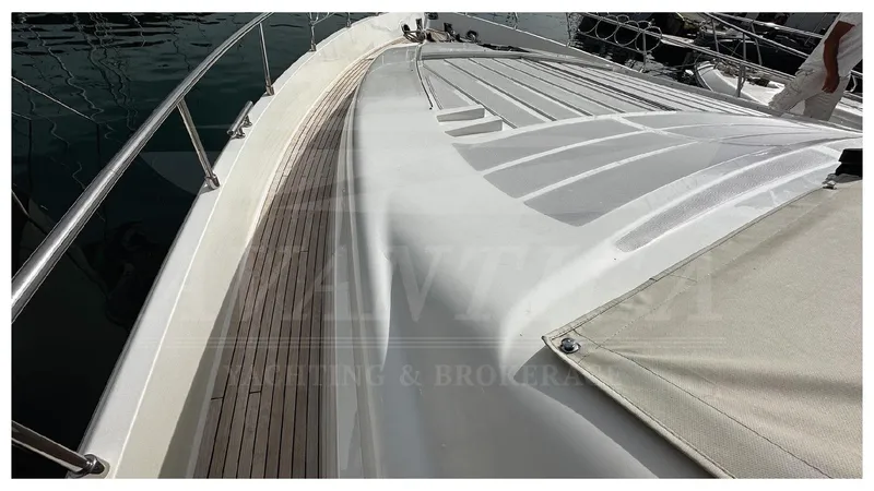  Yacht Photos Pics 2003 Ferretti Yachts 680 deck view with sleek design and wooden accents.