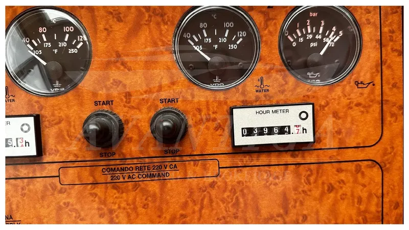  Yacht Photos Pics Control panel of a 2003 Ferretti Yachts 680 with gauges and hour meter.