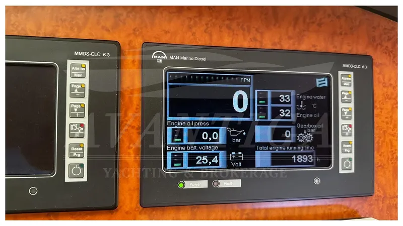 Yacht Photos Pics Control panel of a 2003 Ferretti Yachts 680, displaying engine diagnostics and metrics.