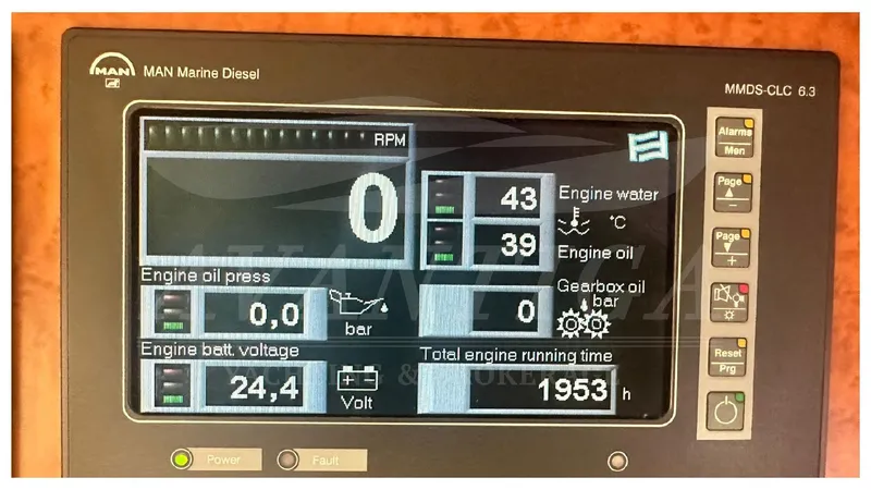  Yacht Photos Pics Control panel of a 2003 Ferretti Yachts 680, displaying engine metrics and running time.