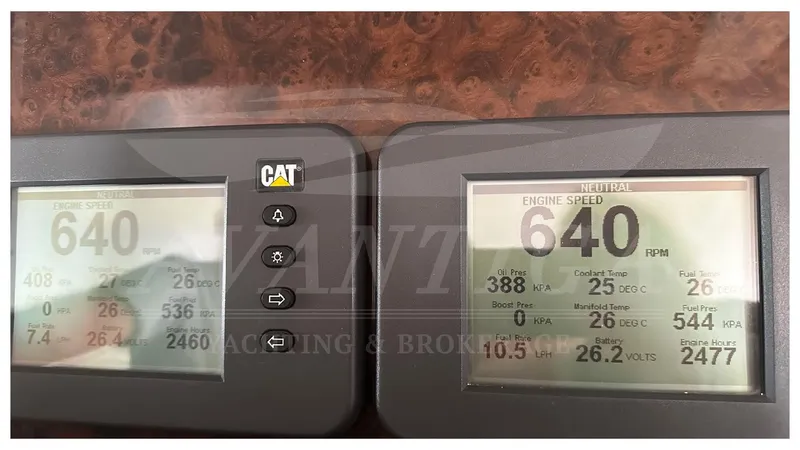  Yacht Photos Pics Engine control panel of 2003 Ferretti Yachts 680 displaying RPM and engine data.