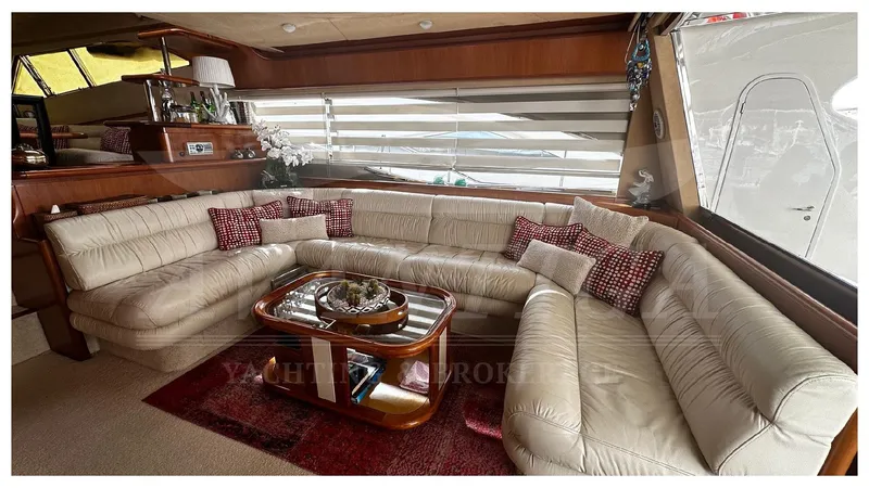  Yacht Photos Pics Luxurious interior of 2003 Ferretti Yachts 680 with plush seating and elegant decor.