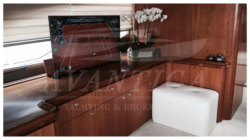  Yacht Photos Pics Luxurious interior of 2003 Ferretti Yachts 680 with TV and elegant decor.
