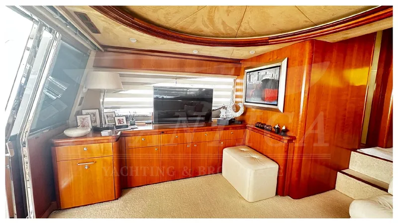  Yacht Photos Pics Luxurious interior of 2003 Ferretti Yachts 680 with elegant wood finishes and modern decor.