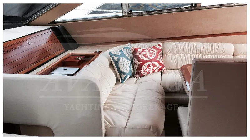 Yacht Photos Pics Luxurious interior of 2003 Ferretti Yachts 680 with plush seating and decorative cushions.