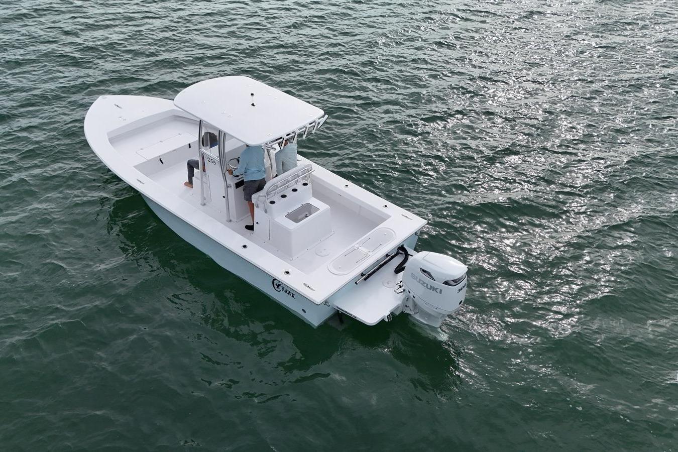 2026 C-Hawk 25 Center Console boat on water, featuring a Suzuki outboard motor.