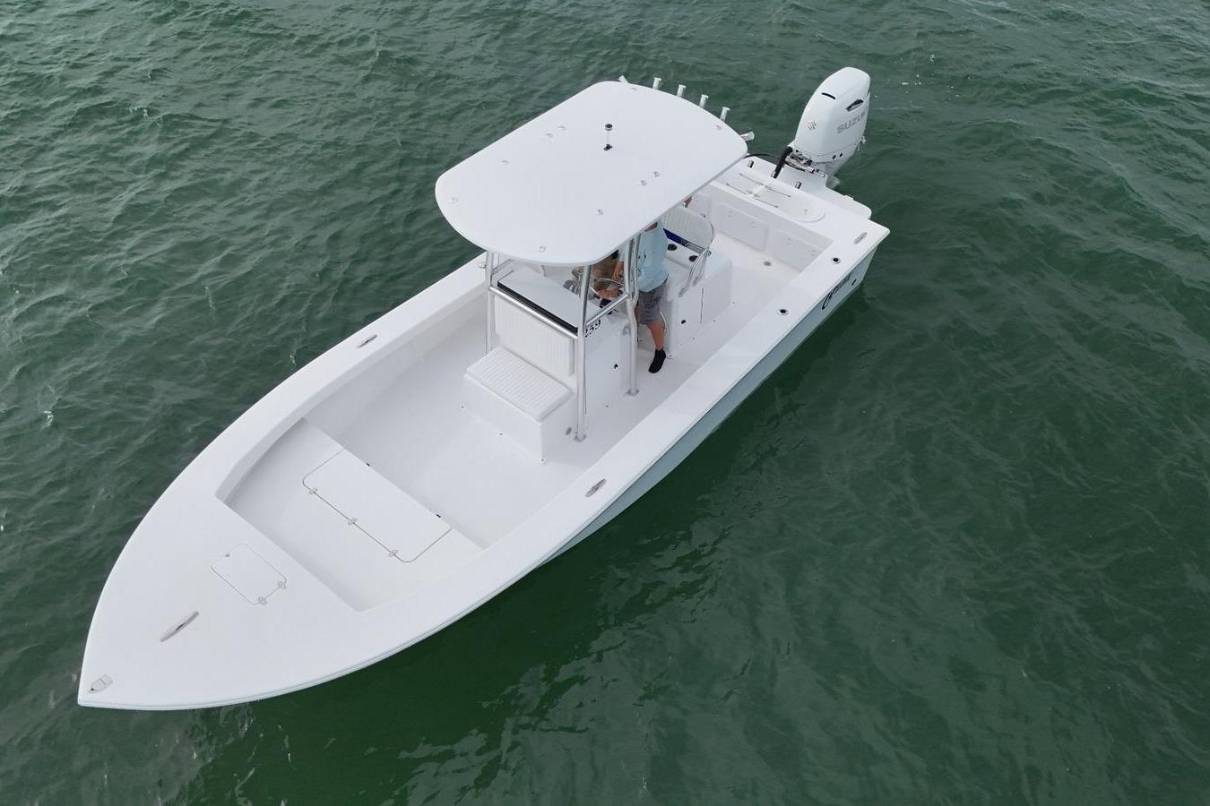 2026 C-Hawk 25 Center Console boat on open water, aerial view.