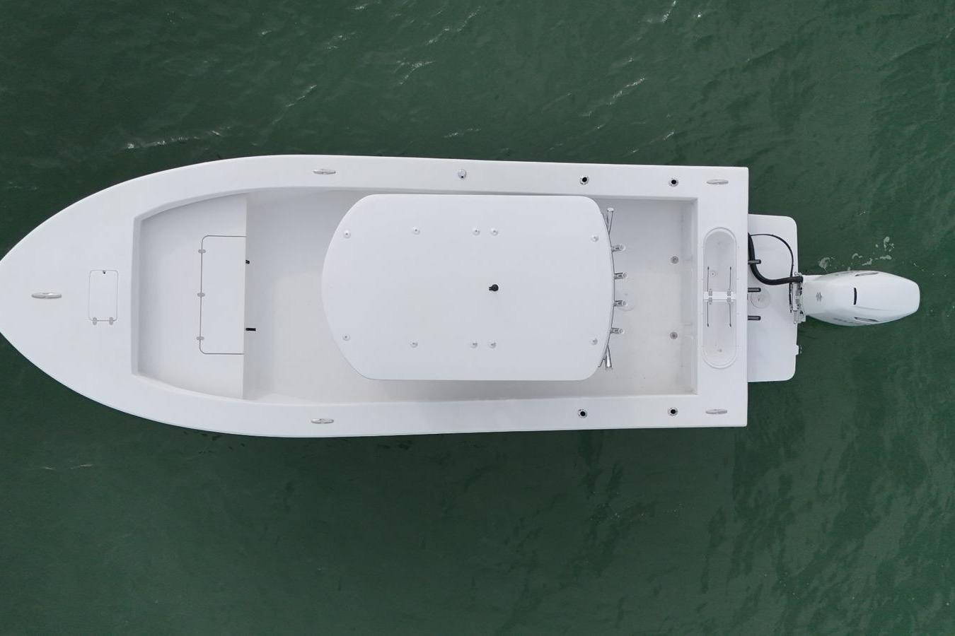 Aerial view of 2026 C-Hawk 25 Center Console boat on water.