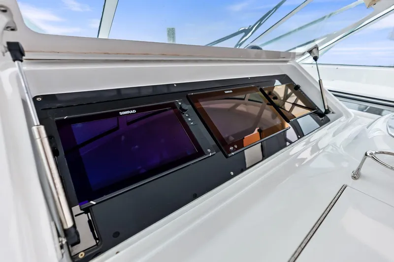 Urgent Sea Yacht Photos Pics Control panel of 2003 Viking 45 Open yacht with Simrad displays.