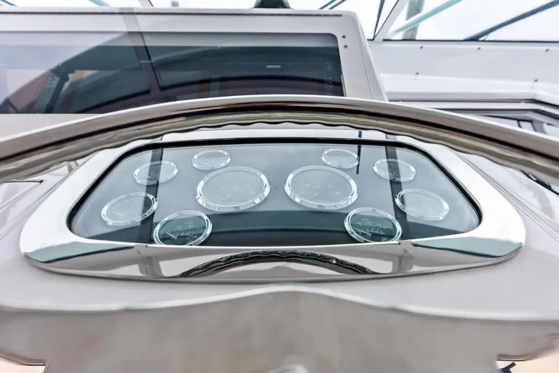 Urgent Sea Yacht Photos Pics Dashboard of a 2003 Viking 45 Open yacht with multiple gauges and controls.