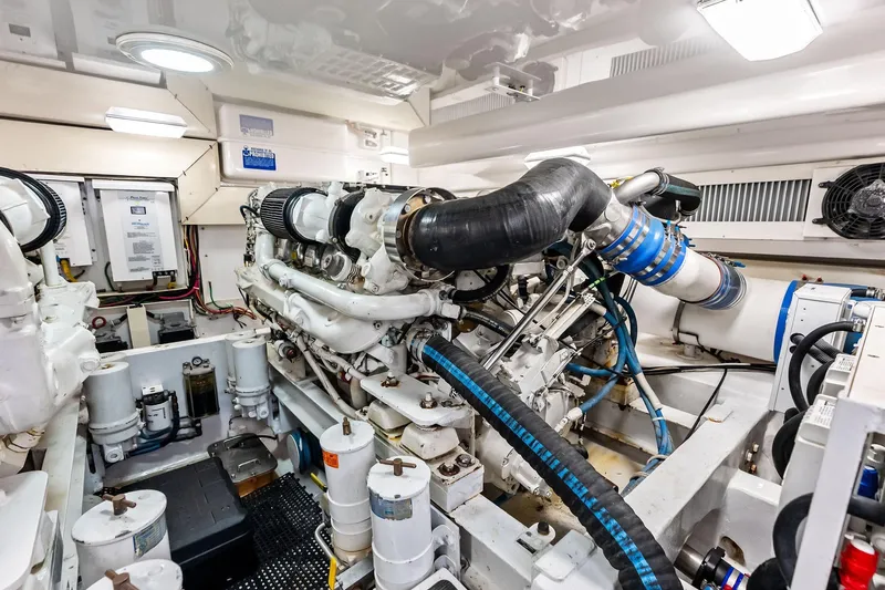 Urgent Sea Yacht Photos Pics Engine room of 2003 Viking 45 Open yacht, showcasing complex machinery and components.