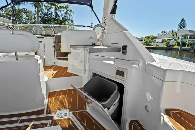 Yaeli Yacht Photos Pics 2005 Regal Commodore 3560 yacht interior with sleek design and wooden flooring.