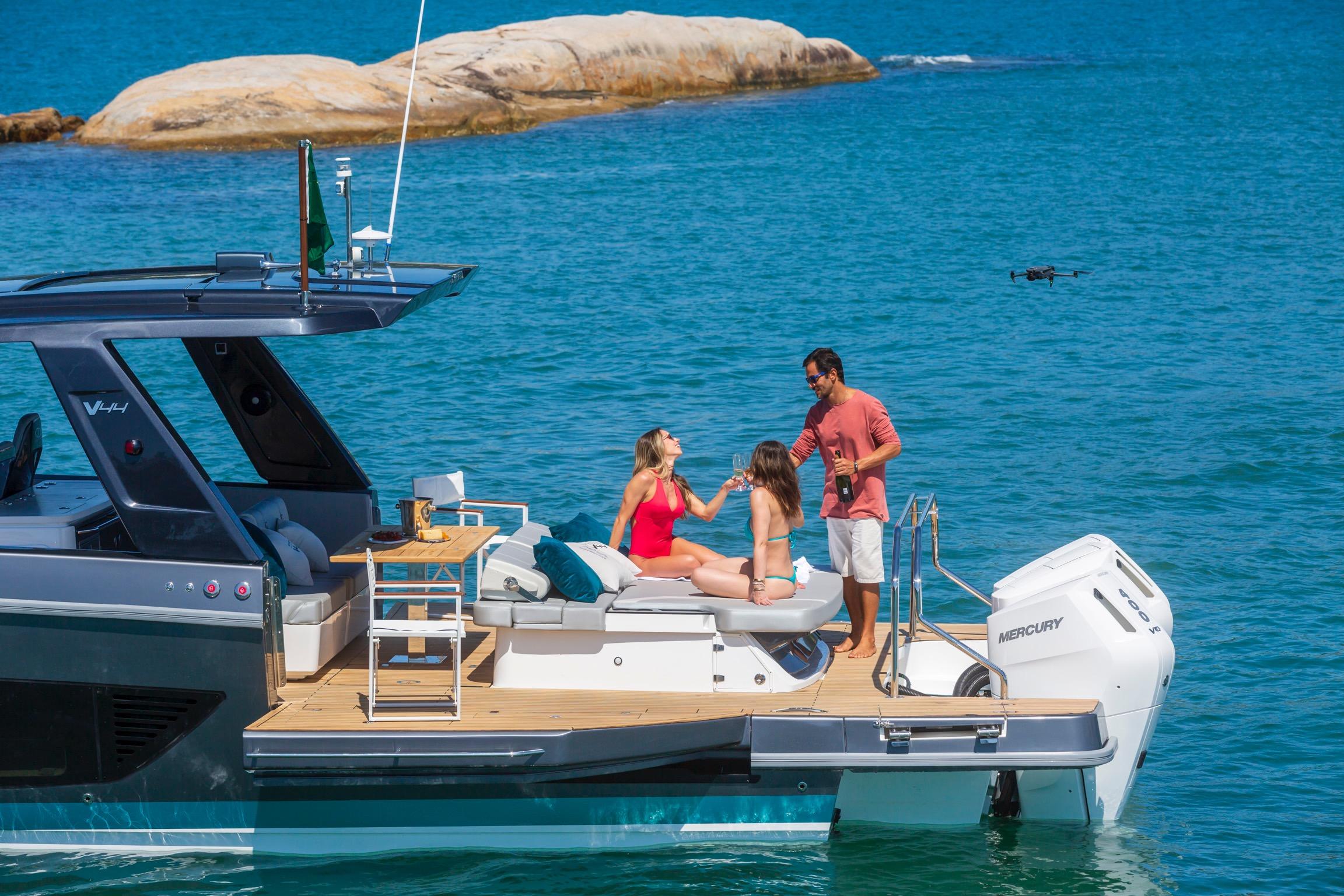 2026 Schaefer Yachts V44 with people enjoying a sunny day on the water.