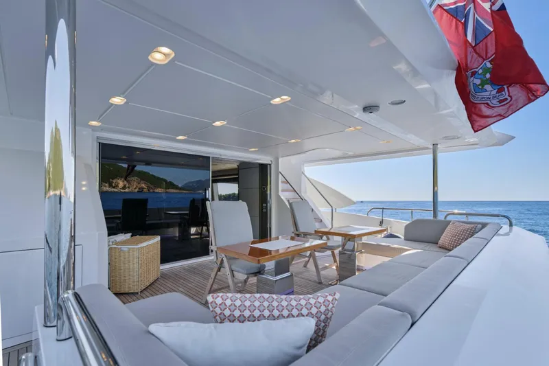 Silvia Yacht Photos Pics Luxurious 2018 Azimut Grande 30 Metri yacht deck with elegant seating and ocean view.