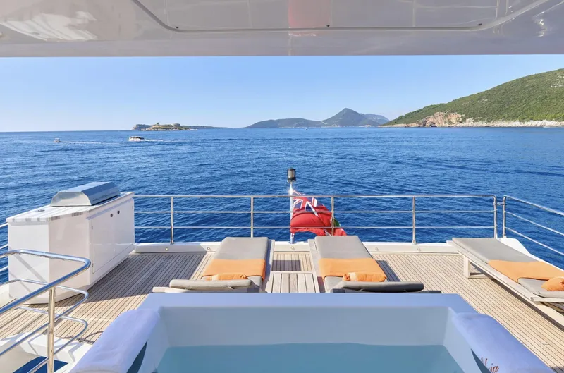 Silvia Yacht Photos Pics Luxurious Azimut Grande 30 Metri yacht deck with sun loungers and ocean view, 2018 model.