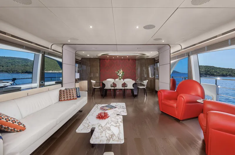 Silvia Yacht Photos Pics Luxurious interior of 2018 Azimut Grande 30 Metri yacht with elegant seating and dining area.