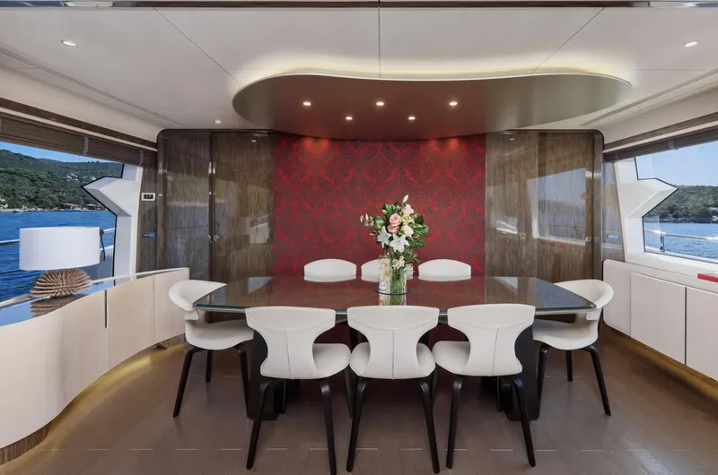 Silvia Yacht Photos Pics Luxurious dining area on 2018 Azimut Grande 30 Metri yacht with elegant decor.
