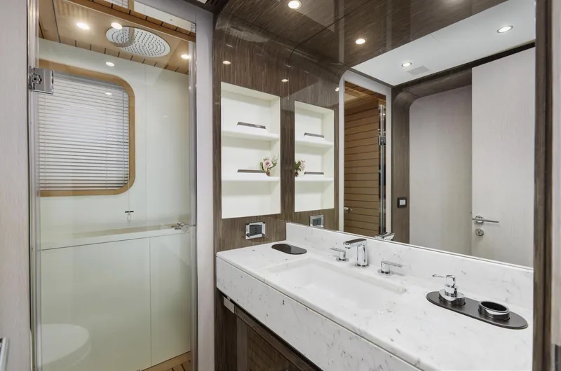 Silvia Yacht Photos Pics Luxurious bathroom in 2018 Azimut Grande 30 Metri yacht with modern fixtures and elegant design.