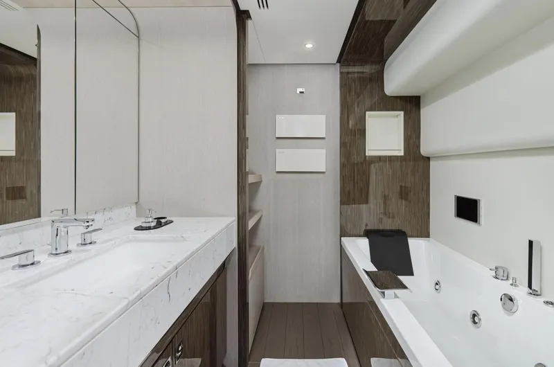 Silvia Yacht Photos Pics Luxurious bathroom in 2018 Azimut Grande 30 Metri yacht with modern fixtures and elegant design.