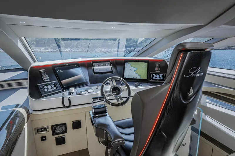 Silvia Yacht Photos Pics Luxurious helm of 2018 Azimut Grande 30 Metri yacht with advanced navigation systems.