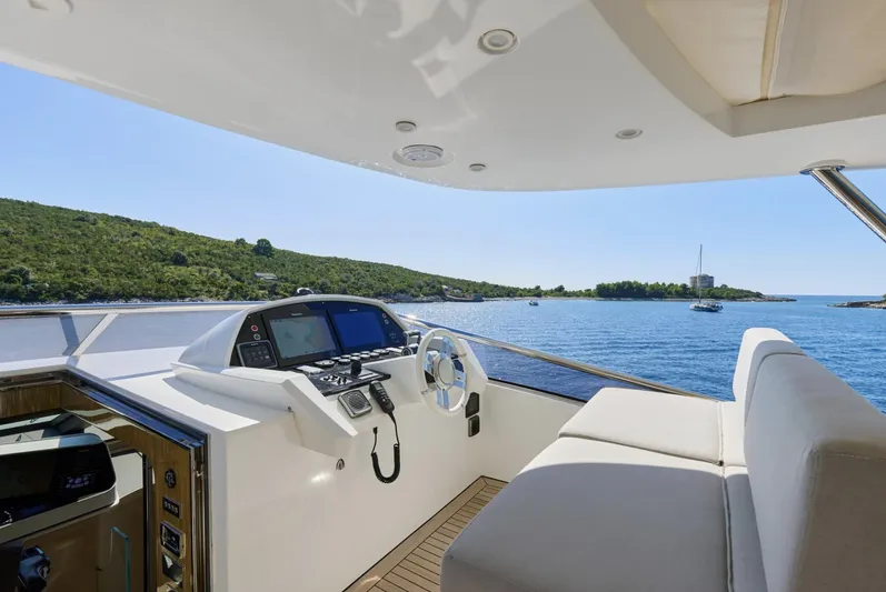 Silvia Yacht Photos Pics Helm of 2018 Azimut Grande 30 Metri yacht with scenic ocean view.