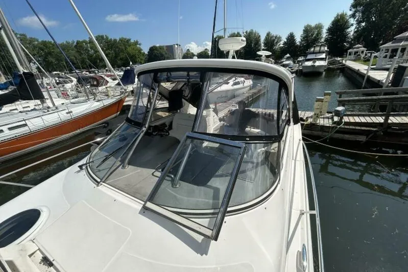  Yacht Photos Pics 2007 Regal 3760 Commodore yacht docked at marina, surrounded by sailboats.