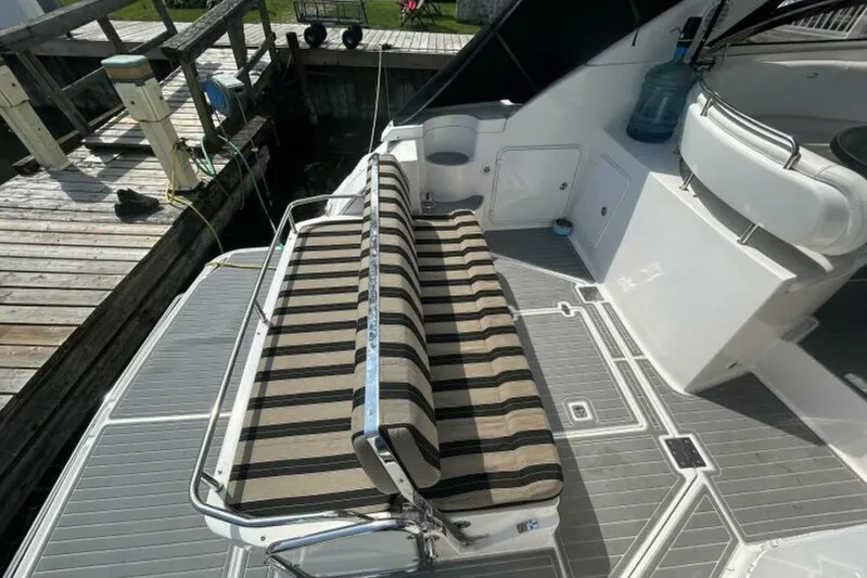  Yacht Photos Pics 2007 Regal 3760 Commodore boat with striped seating and dockside view.
