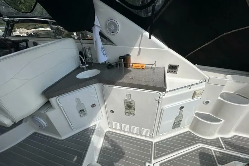  Yacht Photos Pics 2007 Regal 3760 Commodore yacht interior with kitchenette and seating area.