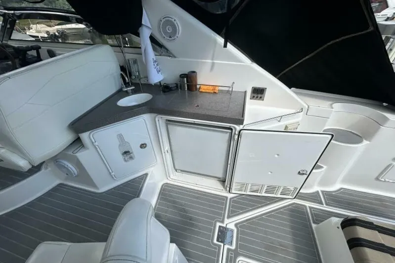  Yacht Photos Pics 2007 Regal 3760 Commodore yacht interior with kitchenette and seating area.