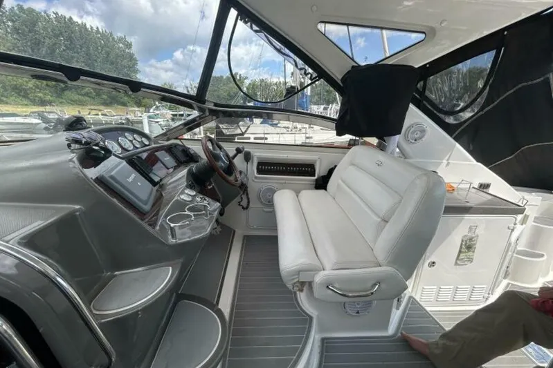  Yacht Photos Pics 2007 Regal 3760 Commodore boat interior with helm and seating area.