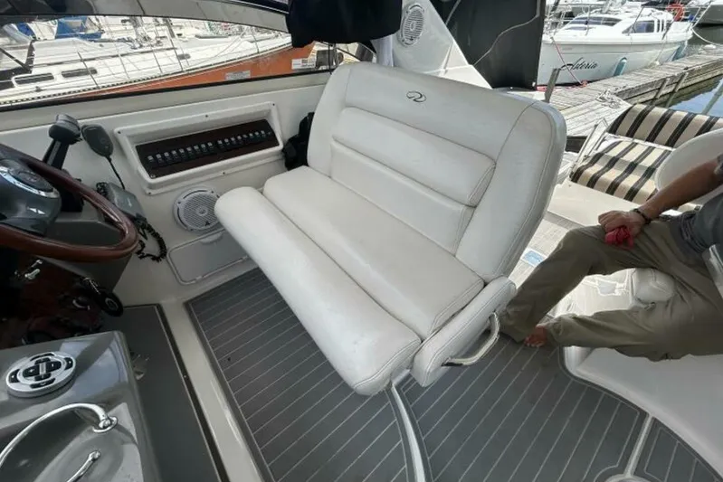  Yacht Photos Pics 2007 Regal 3760 Commodore boat interior with white seating and control panel.