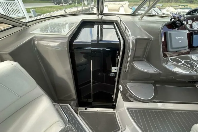  Yacht Photos Pics 2007 Regal 3760 Commodore cockpit with sleek design and modern navigation equipment.