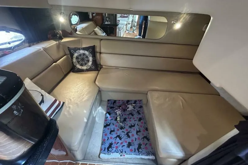  Yacht Photos Pics Interior of 2007 Regal 3760 Commodore with beige seating and nautical decor.