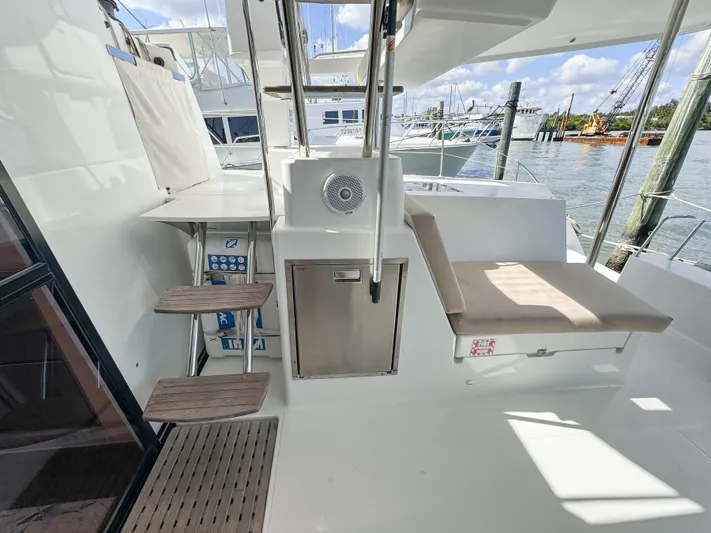 Alisei Yacht Photos Pics Fountaine Pajot Helia 44 Evolution 2017 yacht deck with seating and storage.