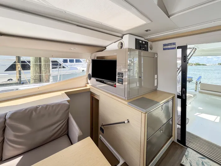 Alisei Yacht Photos Pics Interior of 2017 Fountaine Pajot Helia 44 Evolution yacht with modern kitchen amenities.