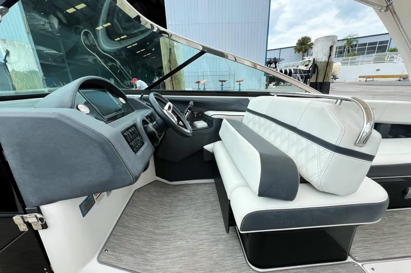  Yacht Photos Pics Interior of 2019 Regal 29 OBX boat with modern dashboard and seating.