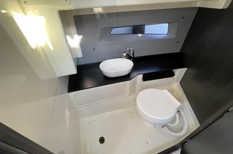  Yacht Photos Pics Modern bathroom in 2025 Navan S30 boat with sleek fixtures and compact design.