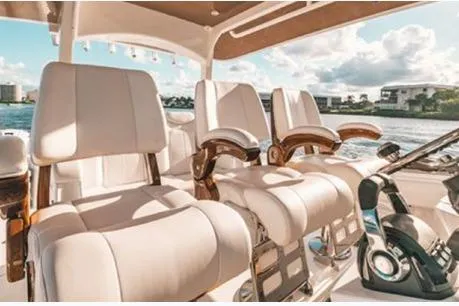  Yacht Photos Pics Luxurious seating on 2026 HCB 42 Lujo boat with scenic waterfront view.