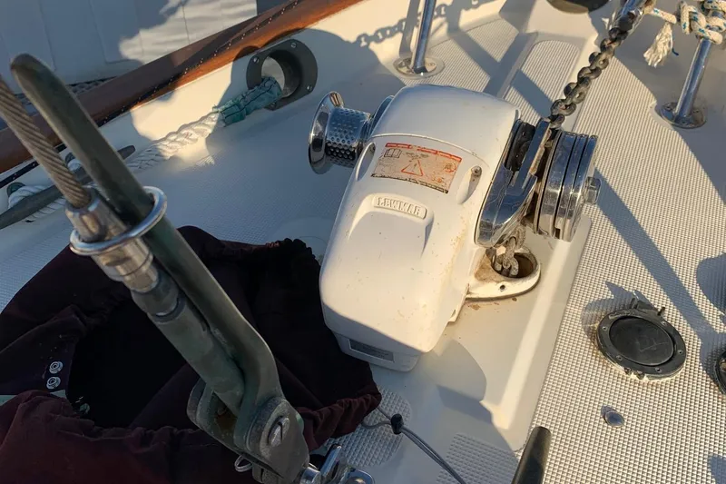  Yacht Photos Pics Deck equipment on a 1990 Pacific Seacraft 37 sailboat, featuring a windlass and chain.