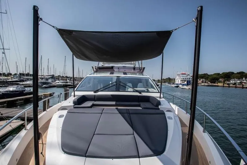  Yacht Photos Pics Luxurious 2020 Pearl 80 yacht with sunshade, docked in marina.