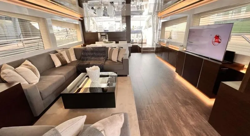  Yacht Photos Pics Luxurious interior of a 2020 Pearl 80 yacht with modern furnishings and elegant decor.