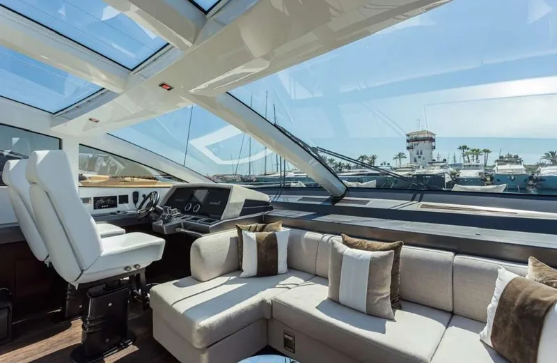  Yacht Photos Pics Luxurious interior of 2020 Pearl 80 yacht with plush seating and panoramic windows.