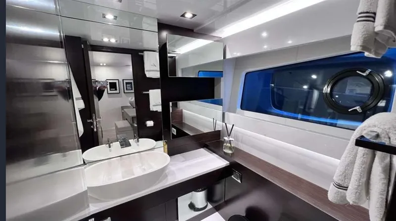  Yacht Photos Pics Luxurious bathroom interior on a 2020 Pearl 80 yacht, featuring modern fixtures and elegant design.