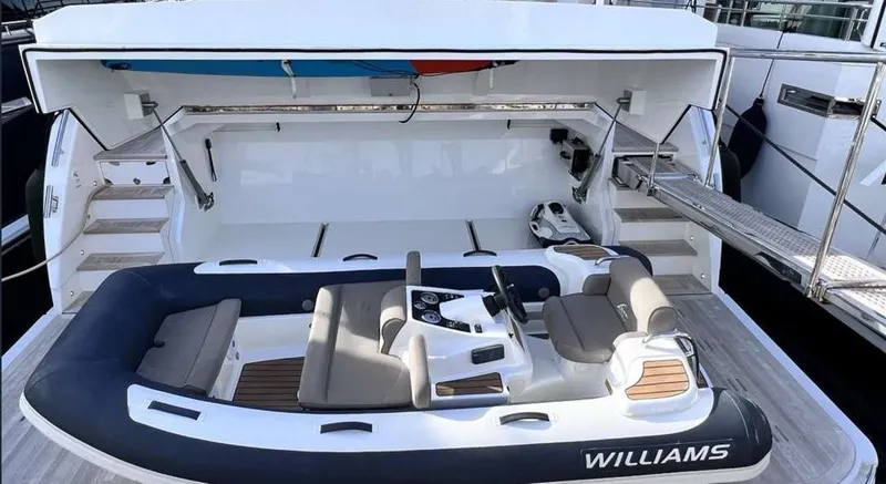  Yacht Photos Pics Inflatable boat in yacht garage, Pearl 80, 2020 model, featuring Williams branding.