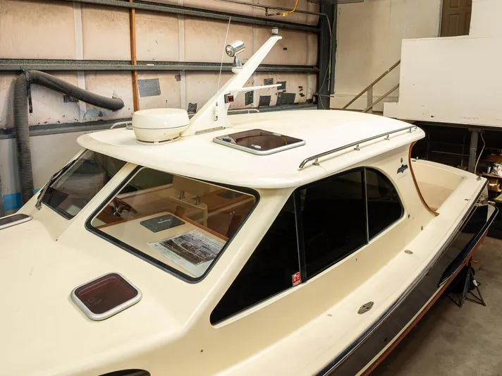 Rough Rider Yacht Photos Pics 2006 Palm Beach Motor Yachts Avalon 32 in a garage setting.