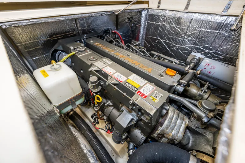 Rough Rider Yacht Photos Pics Engine compartment of 2006 Palm Beach Motor Yachts Avalon 32, showcasing detailed mechanics.