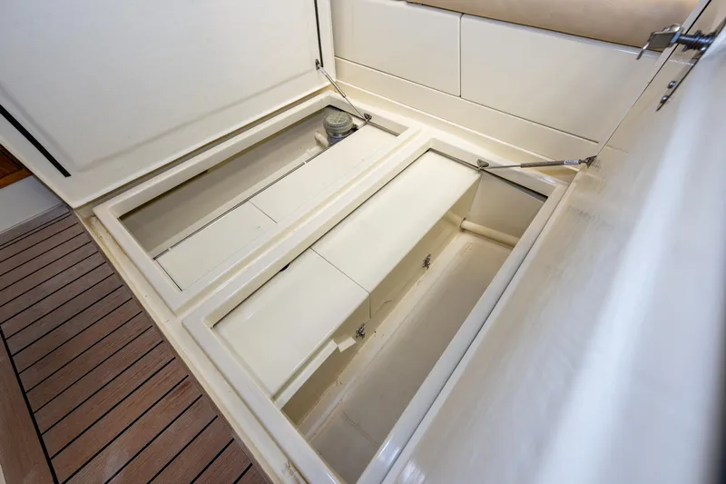 Rough Rider Yacht Photos Pics Open storage compartment on 2006 Palm Beach Motor Yachts Avalon 32.